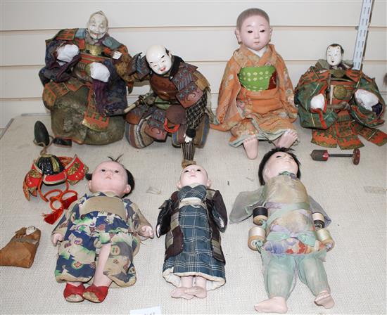 A collection of Japanese lacquered and composition head Gosha dolls, including three Musha Samurai, c.1900-1920